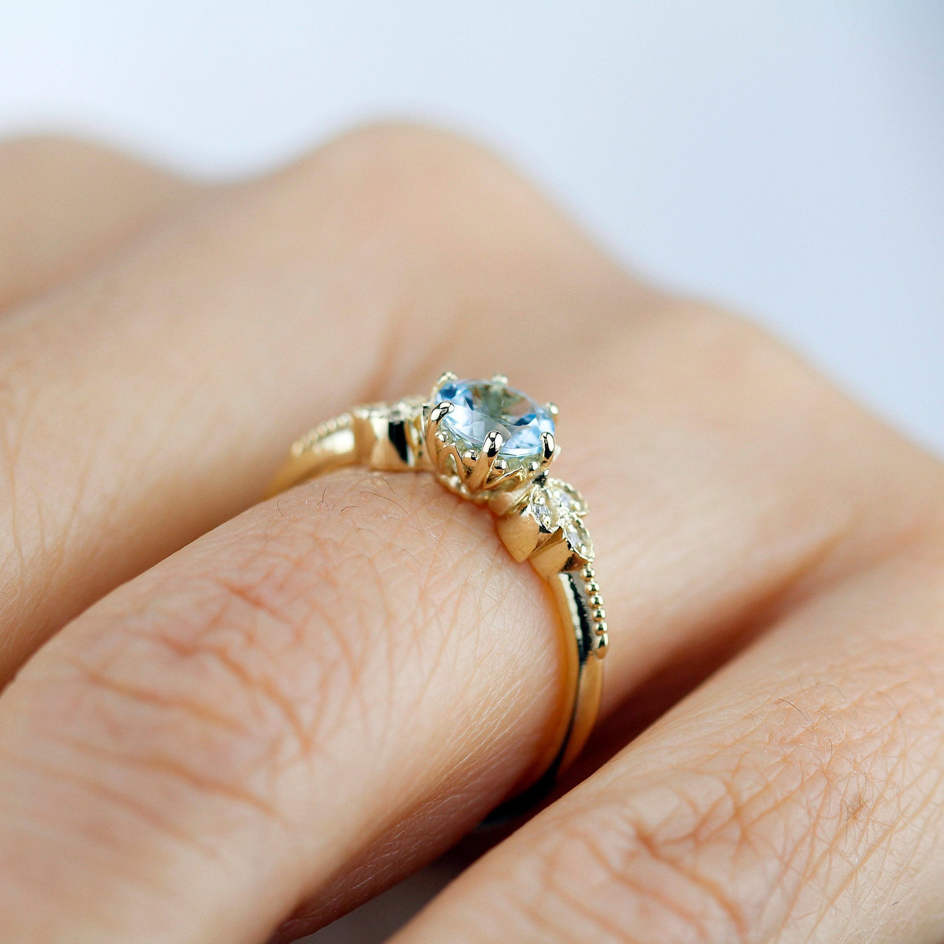 Sky blue topaz engagement ring vintage, marquise diamond setting on the side - NOOI JEWELRY