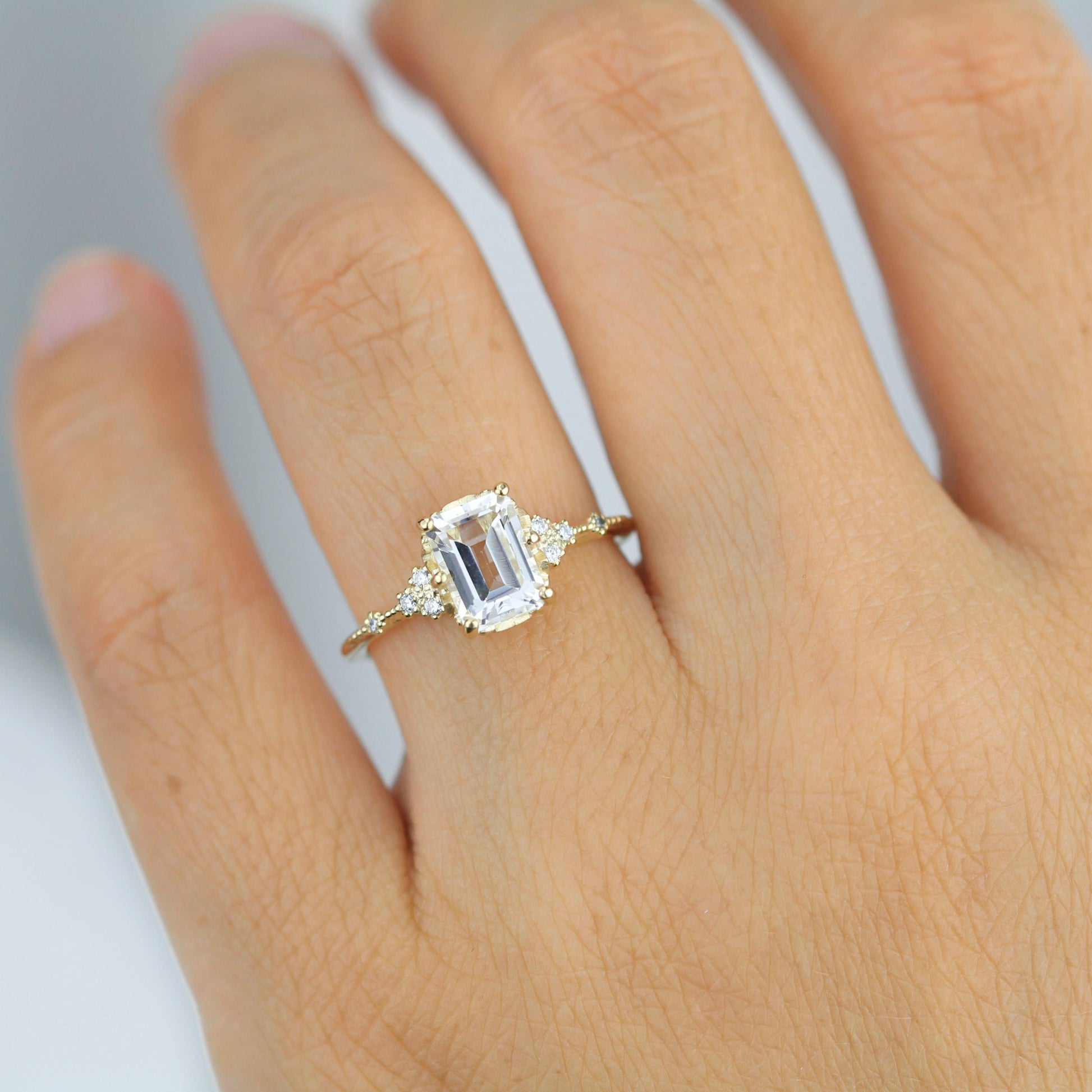 Diamond and white topaz engagement ring, cluster ring emerald cut  | R 348WT